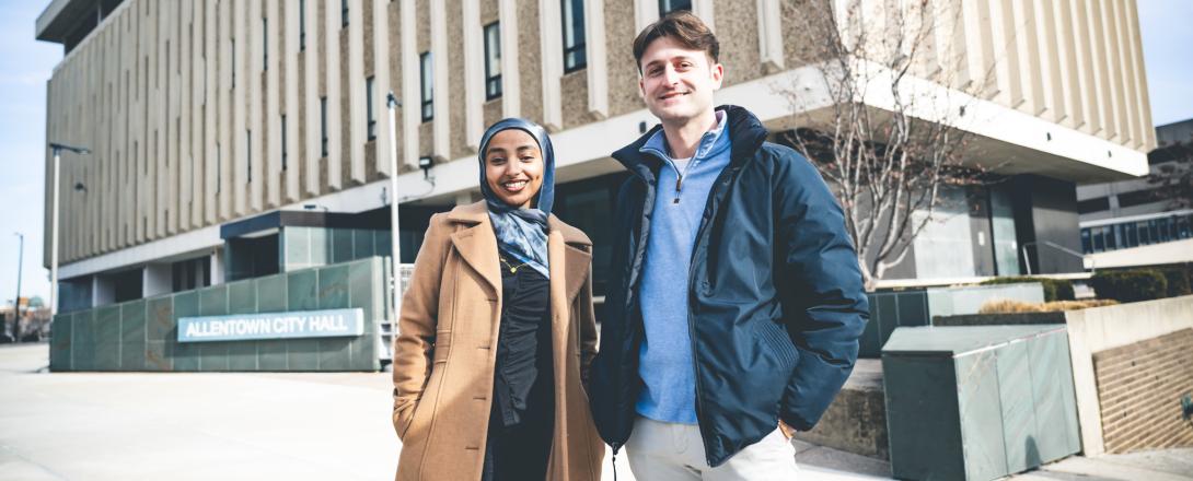 Huda Hagos and Trevor Tormann in front of Allentown City Hall.
